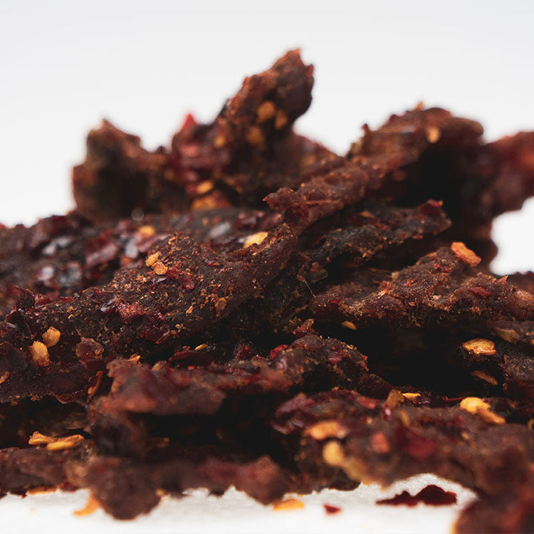 super spicy beef jerky, spicy snack sticks, and summer sausage from pepper joes