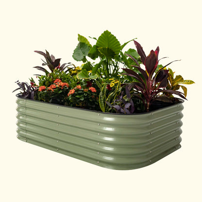 An olive green 6 in 1 small modular metal raised garden bed with colorful flowers and plants on a white background.