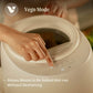 Person interacting with the Kitchen Composter labeled 'Vego Mode' with text about waste addition mid-run without restarting.