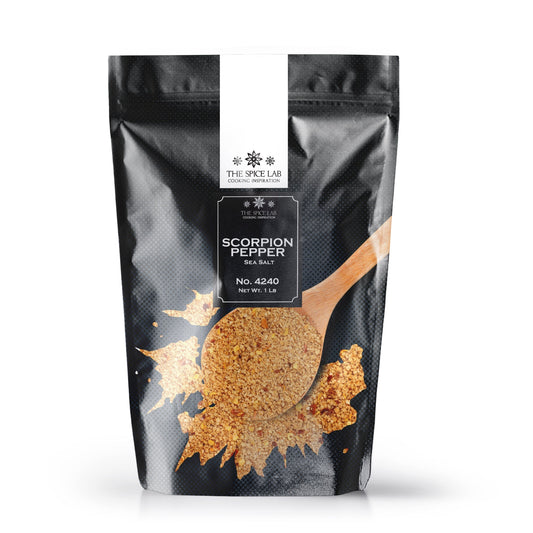 Black spice bag labeled 'Scorpion Pepper Sea Salt' on a white background
