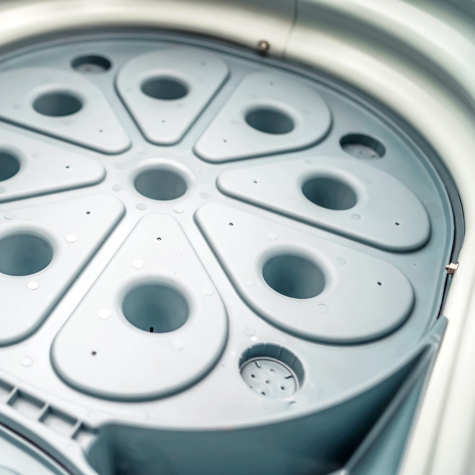 Close up image of a gray wicking cell inside the self-watering raised garden bed. 