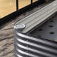 Self-Watering Wicking Floor system watering tube installed in a raised garden bed.