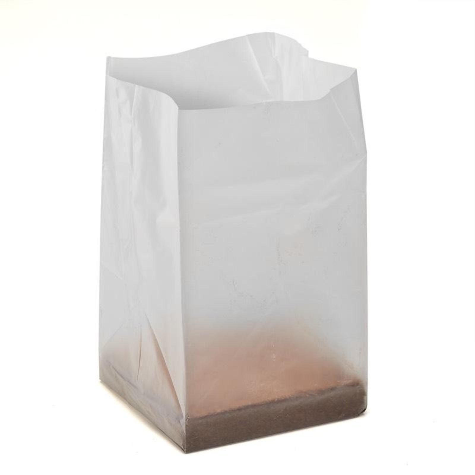 Bag of Urban Worm Coco Coir worm bedding in a bag after being hydrated on a white background