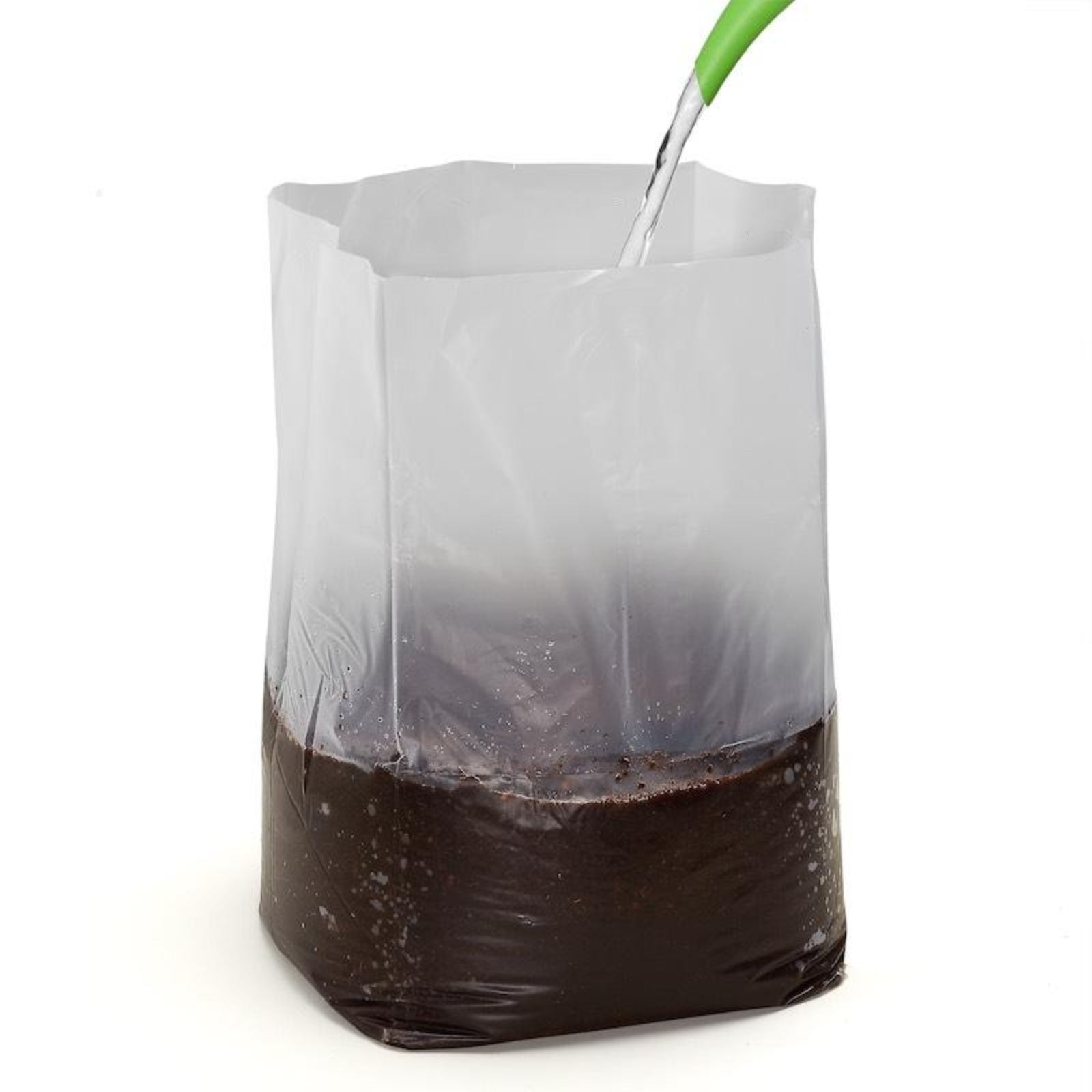 Bag of Urban Worm Coco Coir worm bedding with water being added into it on a white background