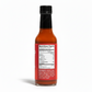 Back label of Árbol Chili & Garlic Hot Sauce bottle showing ingredients and nutrition facts