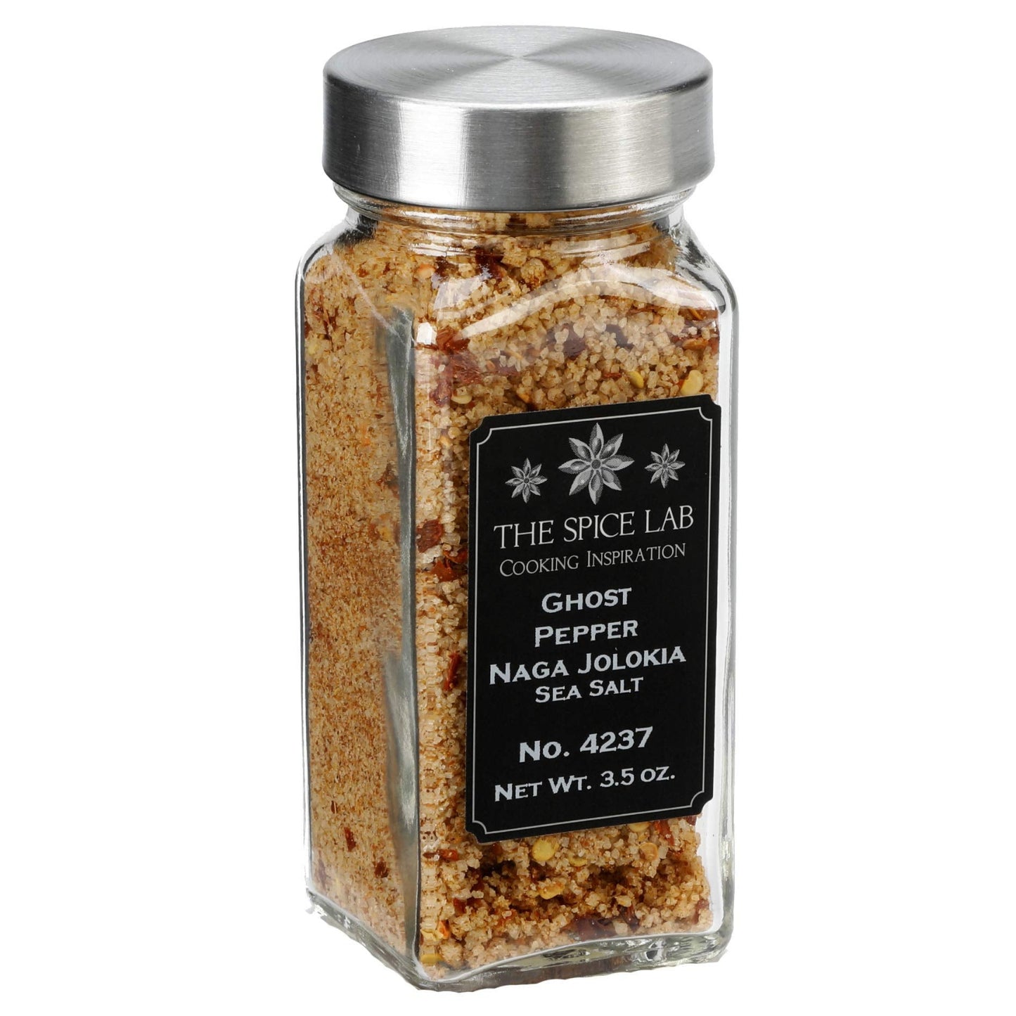 Glass jar of ghost pepper Naga Jolokia sea salt with a metal lid on a white background